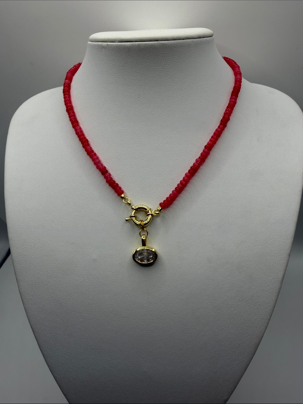 061. Pink Beaded Necklace with Gold and Clear Crystal Pendant. 16”